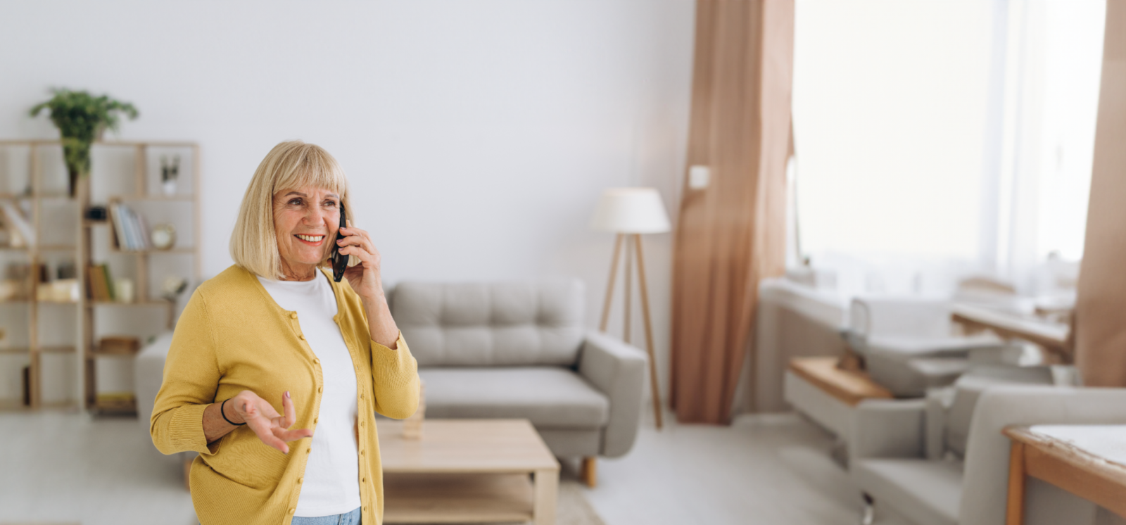 older woman speaking on the phone